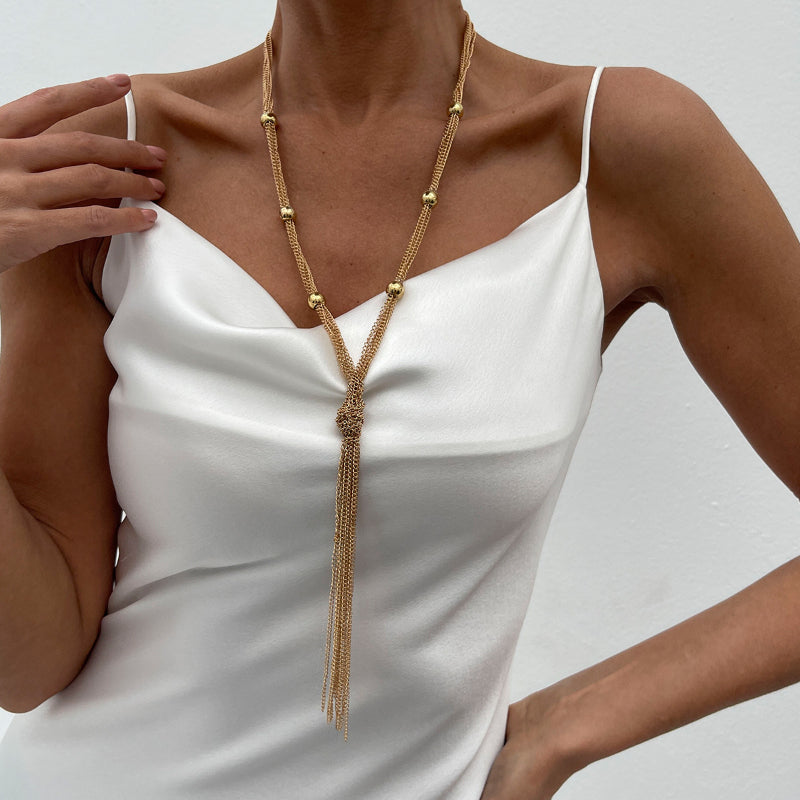Simple Y-shaped Metal Tassel Necklace With A Minimalist Understated Style